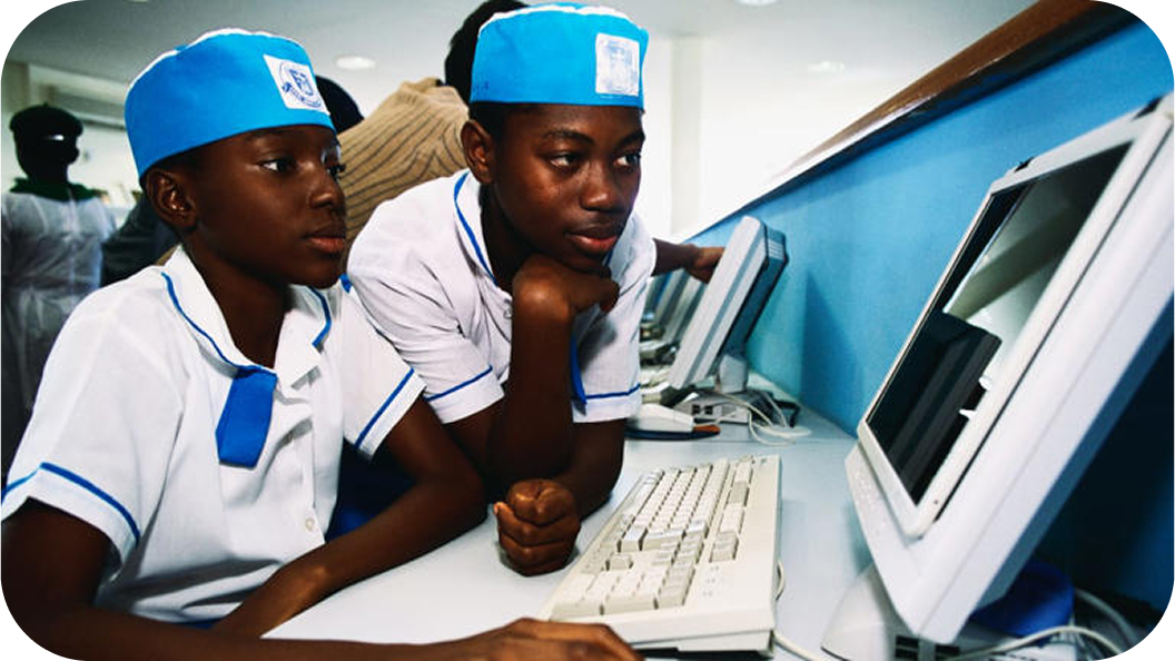 Students in classroom learning technology